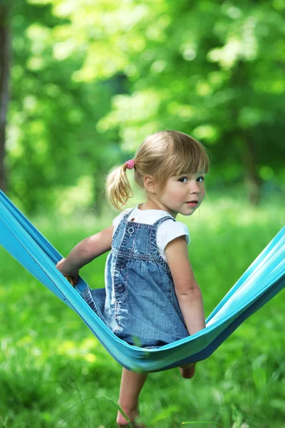 Little girl on a hammock — Stock Photo, Image