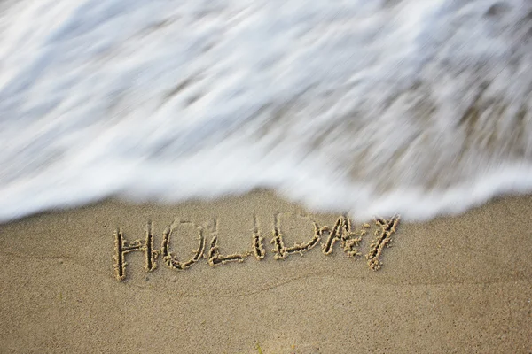 Escrevendo na areia — Fotografia de Stock