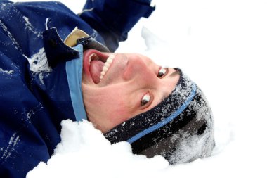 Man lies at snow clipart