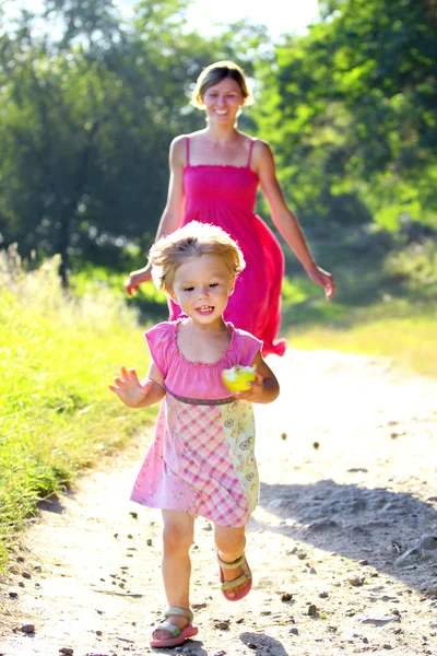 Mother and little daughter on the nature — Stock Photo, Image