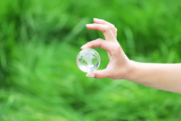 stock image Glass globe in hand