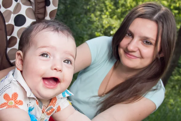 stock image Young mother with a charming baby