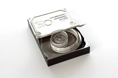 Open hard drive and tape with files clipart