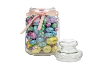 Glass bottle of an chocolate easter eggs clipart