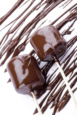 Marshmallow covered by melted chocolate clipart