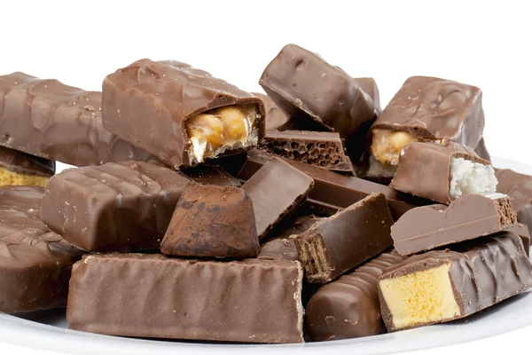 Barras de chocolate com nozes e caramelo — Fotografia de Stock