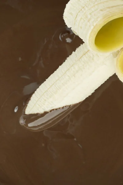 Polewa czekoladowa i banan — Zdjęcie stockowe