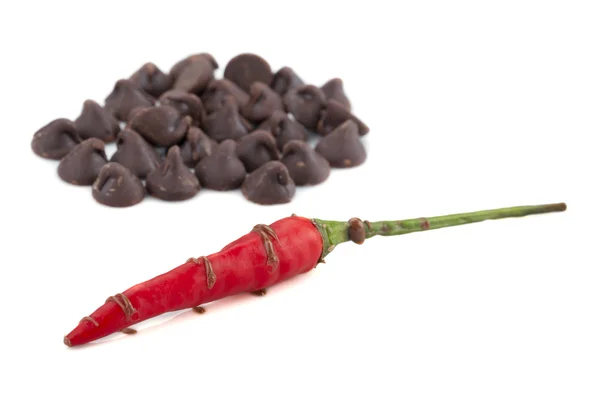 Chocolates with red chili pepper — Stock Photo, Image