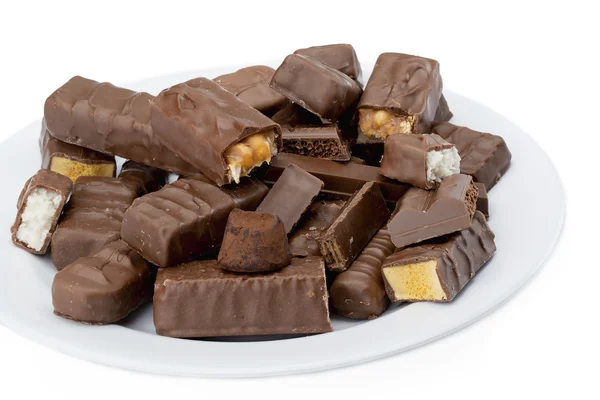 Chocoladerepen op een witte plaat — Stockfoto