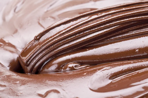 Stängt upp tjocka smält choklad — Stockfoto