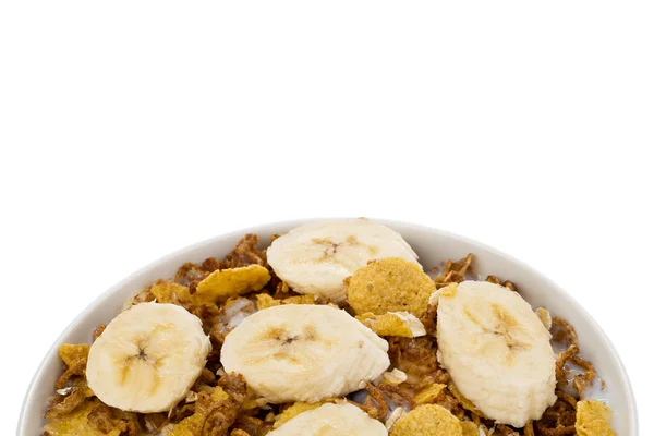 Cropped bowl of cereals with banana — Stock Photo, Image