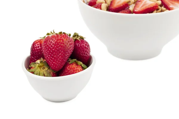 Cropped bowl of cereals and strawberry — Stock Photo, Image