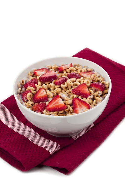 Fruity cereal on a red table napkin — Stock Photo, Image