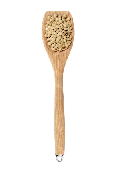 Lentil beans on a wooden ladle — Stock Photo, Image
