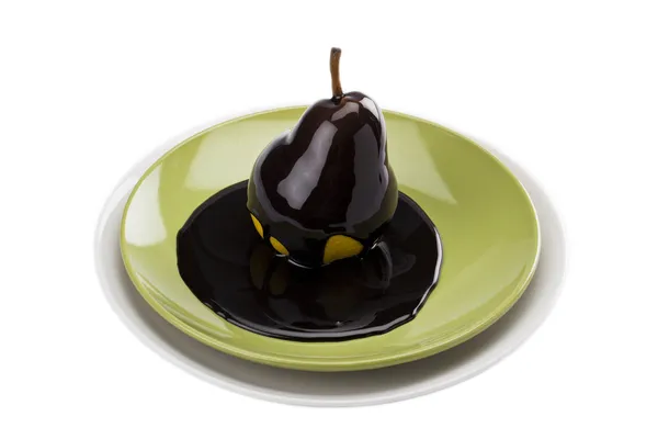 PEAR gedoopt in chocolade siroop — Stockfoto