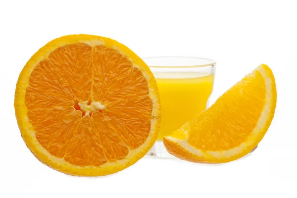 Pomerančový džus a plátek pomeranče — Stock fotografie