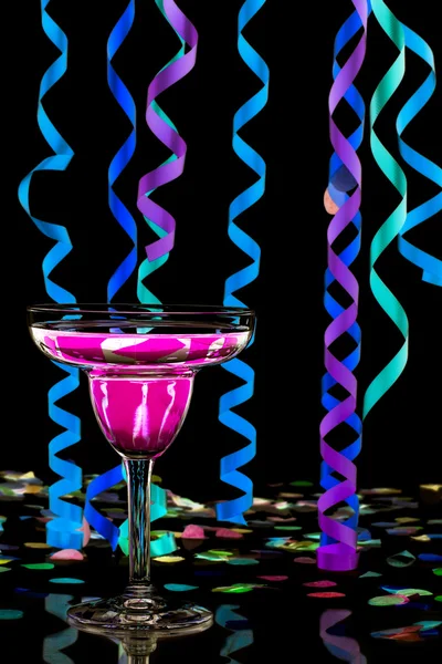 Pink martini and streamers — Stock Photo, Image