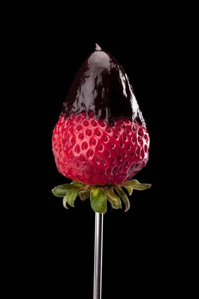 Strawberry dipped in chocolate fondue — Stock Photo, Image