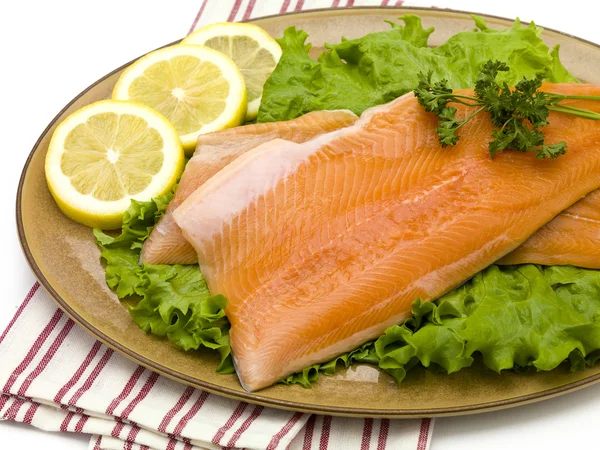 stock image Salmon on Plate with Lettuce and Lemons