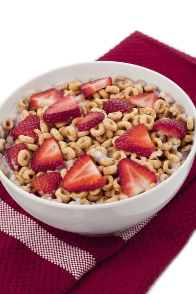 Cereals with slice strawberry toppings Royalty Free Stock Images
