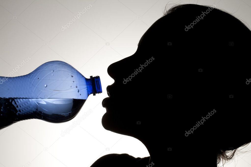 Thirsty female drinking water