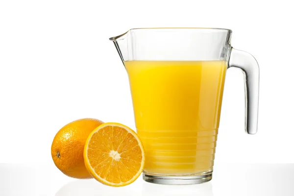 Orange juice in jug — Stock Photo, Image