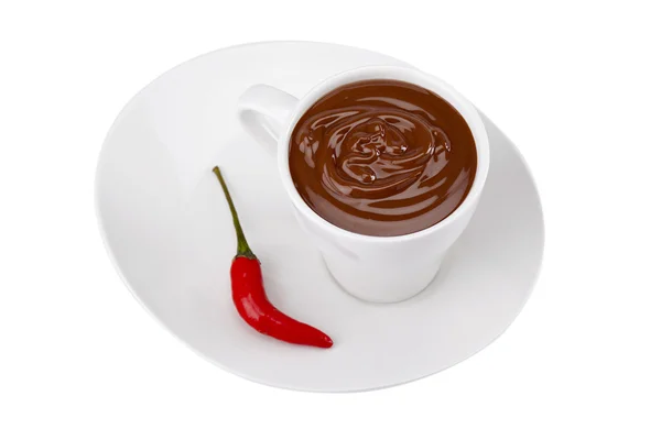 Pimenta fresca e xícara de chocolate em uma chapa — Fotografia de Stock