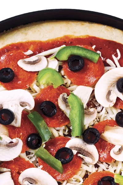 Primo piano della pizza con guarnizioni — Foto Stock