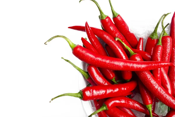 Wet chilli peppers in a bowl — Stock Photo, Image