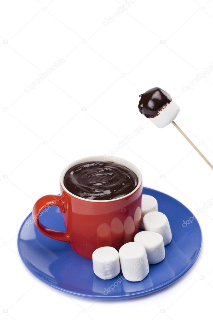 White marshmallow dipped on melted chocolate