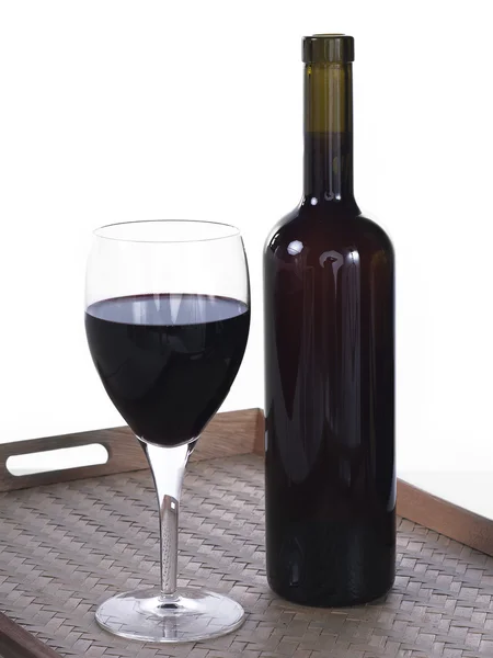 Бокал вина и бутылка — стоковое фото