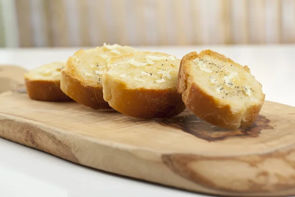 Stokbrood segmenten met verspreiding — Stockfoto