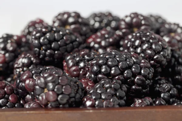 A pile of blackberries on the bowl — Stock Photo, Image