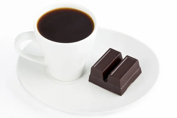 Black coffee and chocolate bar — Stockfoto