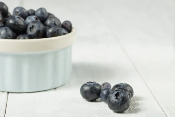 Blueberries in white bowl — Stock Photo, Image
