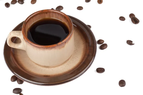 Kahve fincanı ve dağınık fasulye — Stok fotoğraf