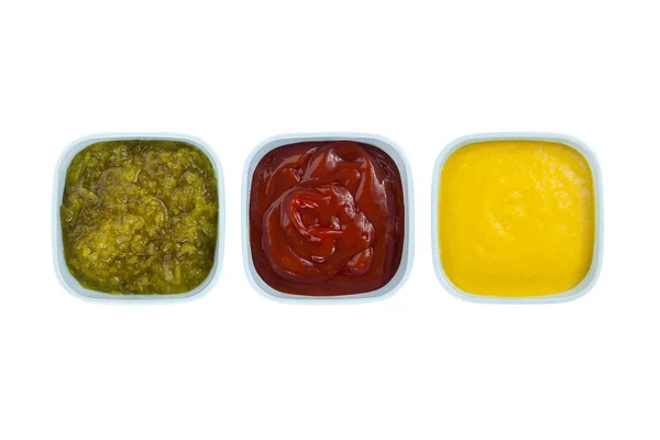 Ketchup mustard pickles on bowl — Stock Photo, Image