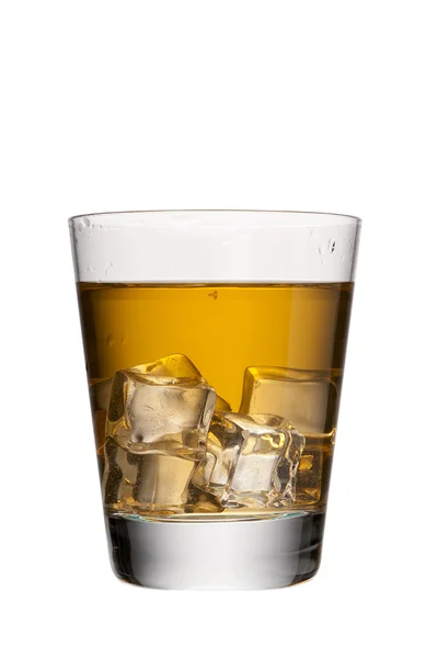 Glass of whiskey with ice cube — Stock Photo, Image
