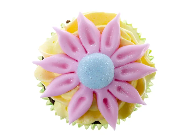 Caramelle di fiori sulla parte superiore del cupcake — Foto Stock