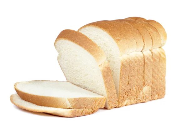 Řez bochník chleba na bílém pozadí — Stock fotografie