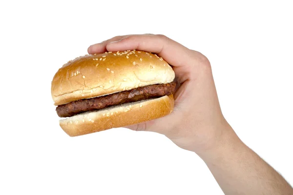 Människor hand med hamburgare — Stockfoto