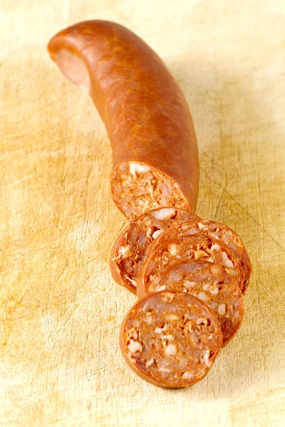 Retrato de salsicha cortada em pedaços — Fotografia de Stock