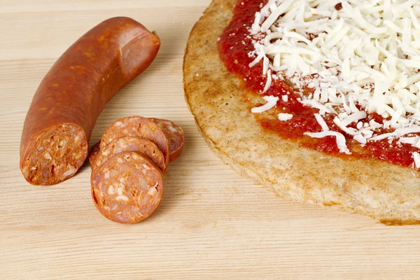 Sausage with pizza — Stock Photo, Image