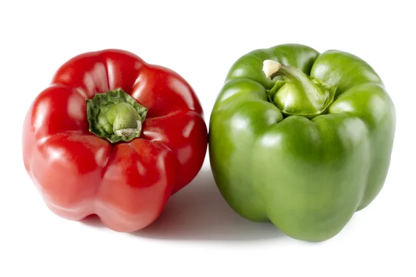 Red and green bell peppers — Stock Photo, Image