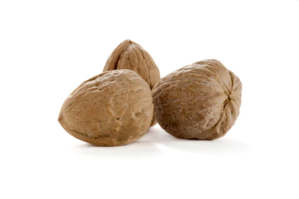 Три грецких ореха — стоковое фото