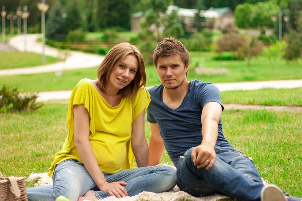 Young pregnant woman with young man — Stock Photo, Image