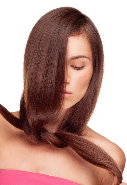 Chica bonita sosteniendo su cabello en un nodo —  Fotos de Stock