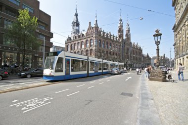 Tram driving in Amsterdam the Netherlands clipart