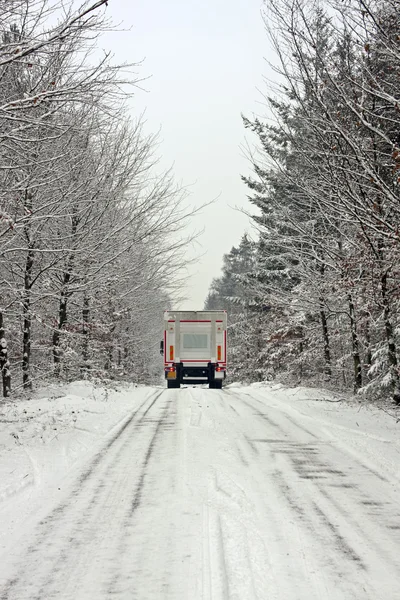 Truck driving in the snow in the countryside from the Netherland — Stock Photo, Image
