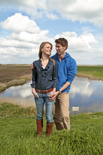 Happy couple in the countryside from the Netherlands — Stock Photo, Image